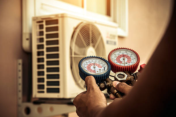 Professional Emergency Hvac technician working in Fairfax Station, VA